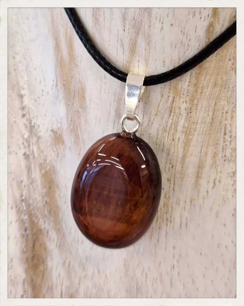Colgante de ojo de buey y plata