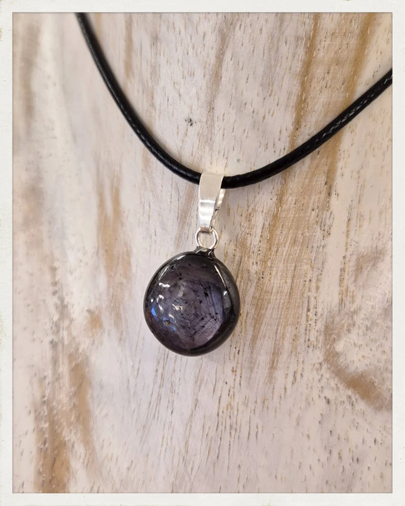 Colgante de zafiro estrella y plata