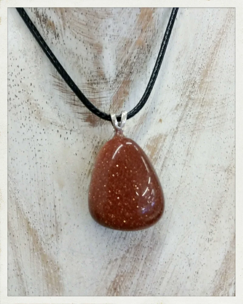 Colgante de goldstone y plata