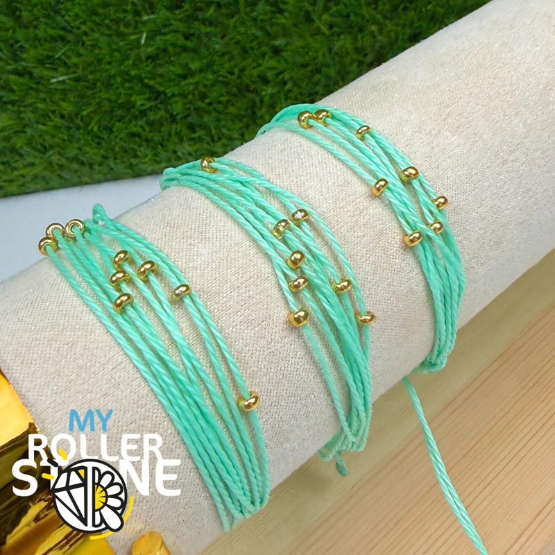 Pulsera de cordón encerado verde con cuentas