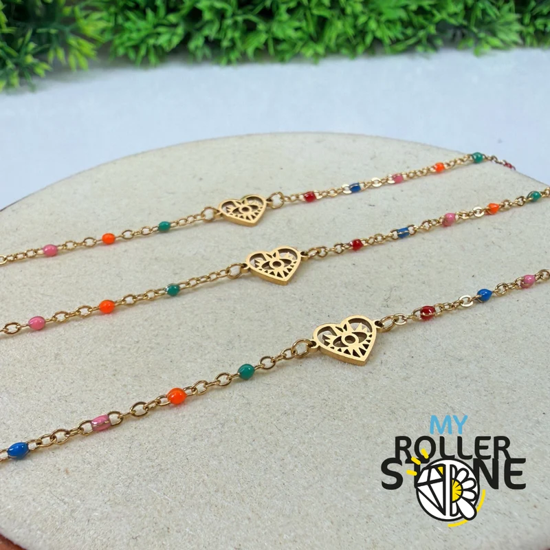 Pulsera turca con ojo y corazón en acero inoxidable.