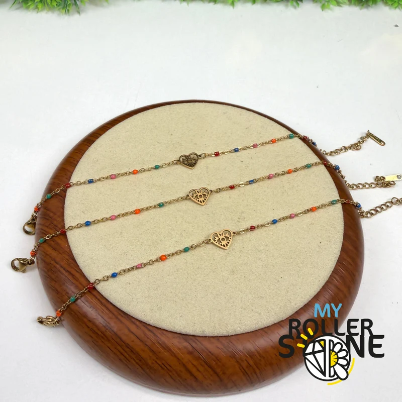 Pulsera turca con ojo y corazón en acero inoxidable.