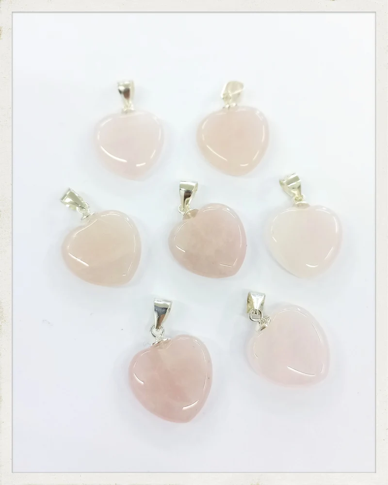 Colgante corazón de cuarzo rosa y plata