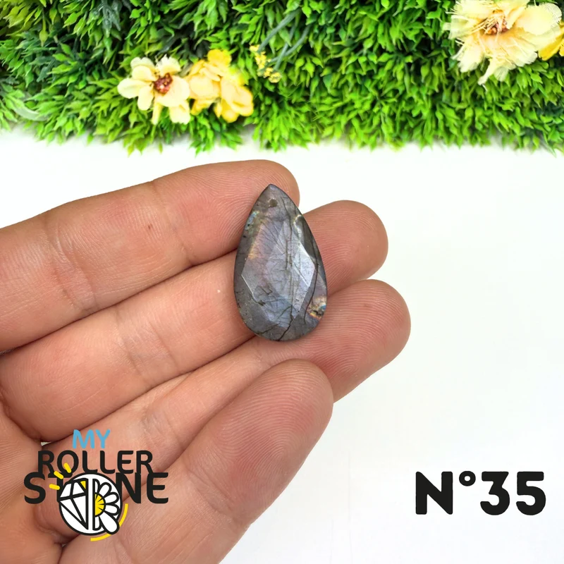 Colgante perforado de espectrolita púrpura facetada