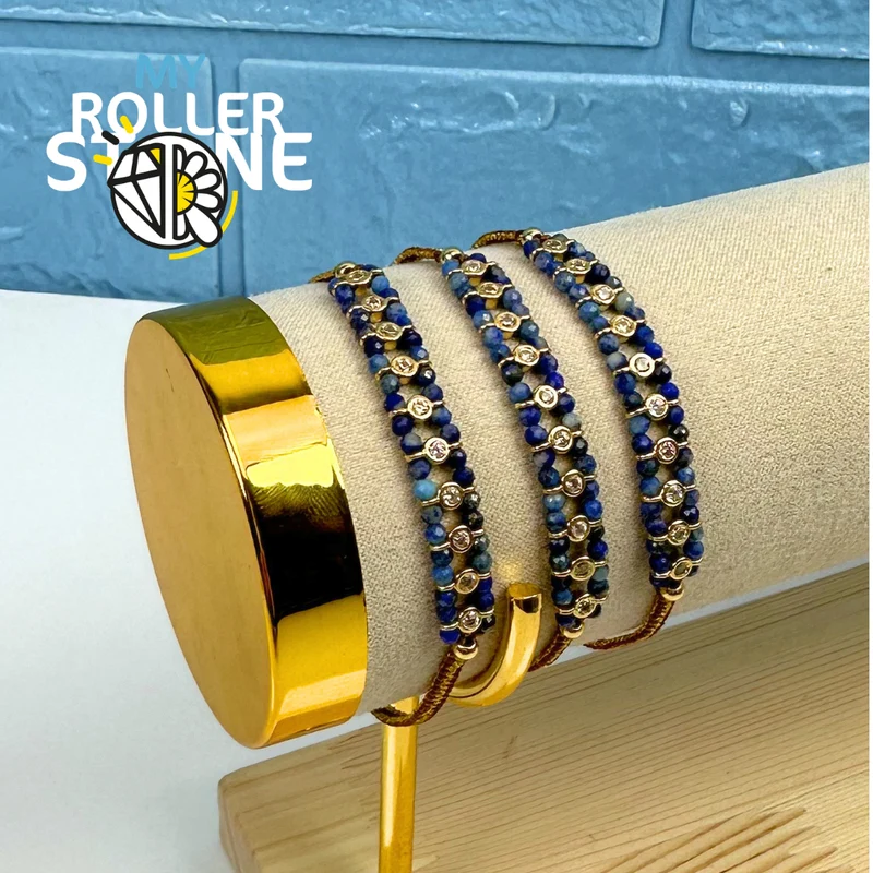 Pulsera trenzada con perlas naturales y diamantes de imitación.