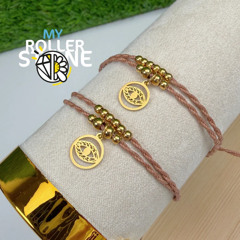 Pulsera turca con forma de ojo, cordón encerado, acero inoxidable.