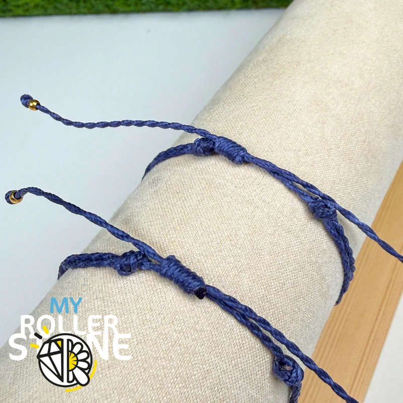 Pulsera con trébol de cuatro hojas, cordón encerado, acero inoxidable.