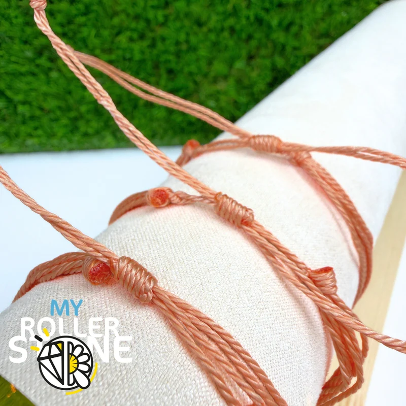 Pulsera de cordón encerado naranja con cuentas