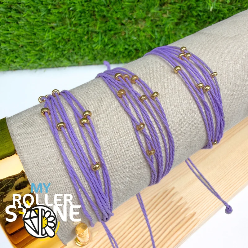 Pulsera de cordón encerado morado con cuentas