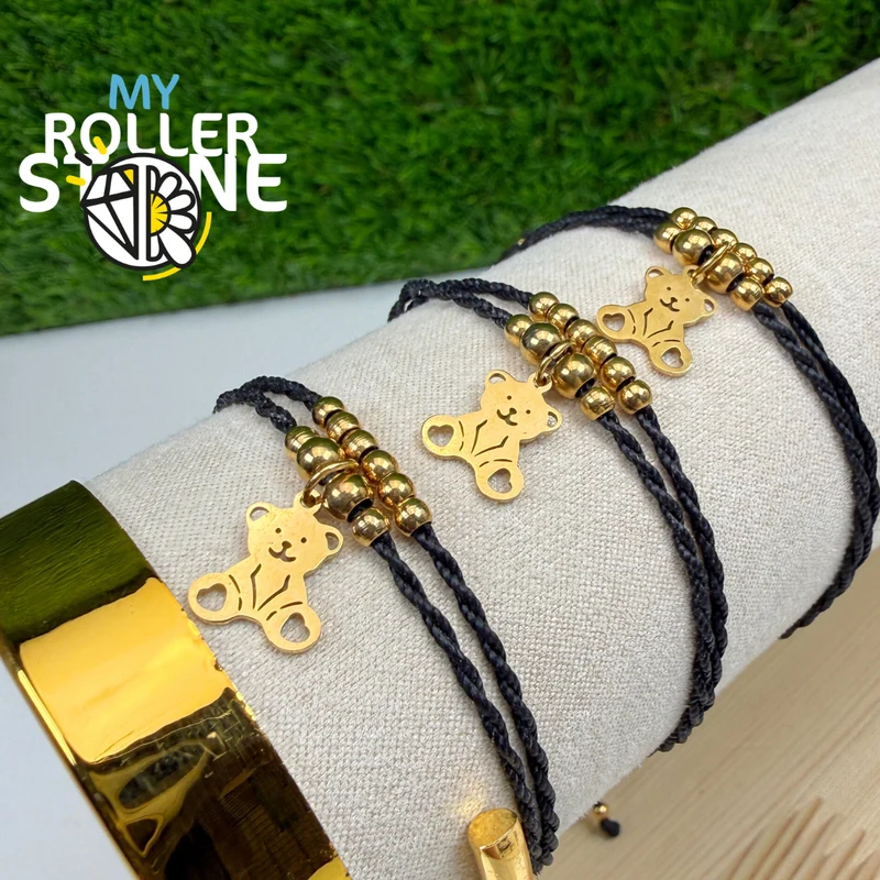 Pulsera con forma de osito de peluche, cordón encerado, acero inoxidable.