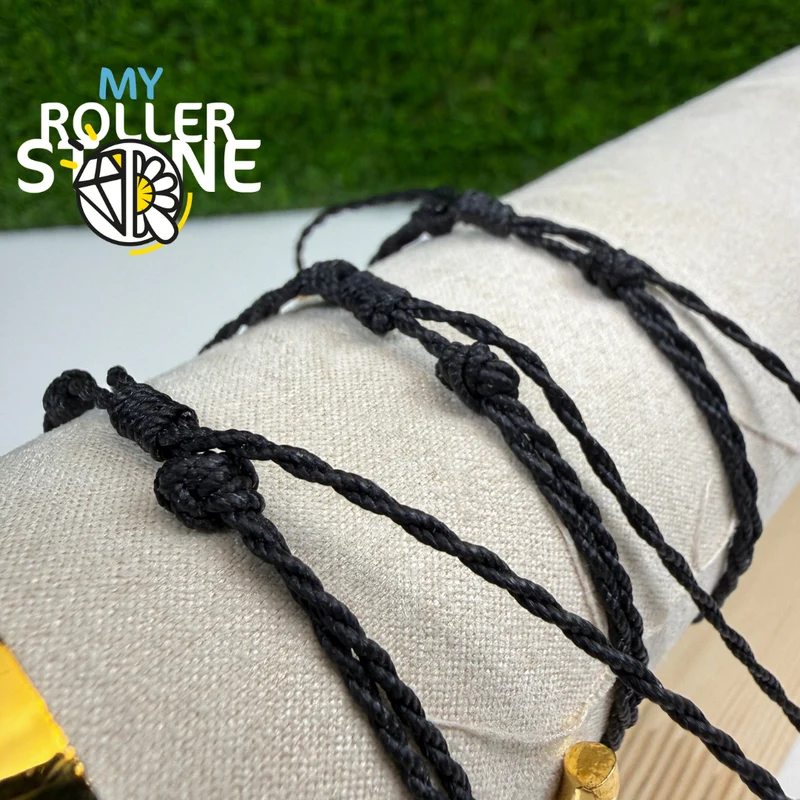 Pulsera con forma de osito de peluche, cordón encerado, acero inoxidable.