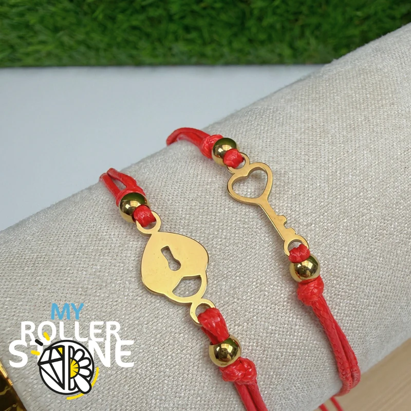 Pulsera de acero inoxidable con llave y candado (se vende en pares)