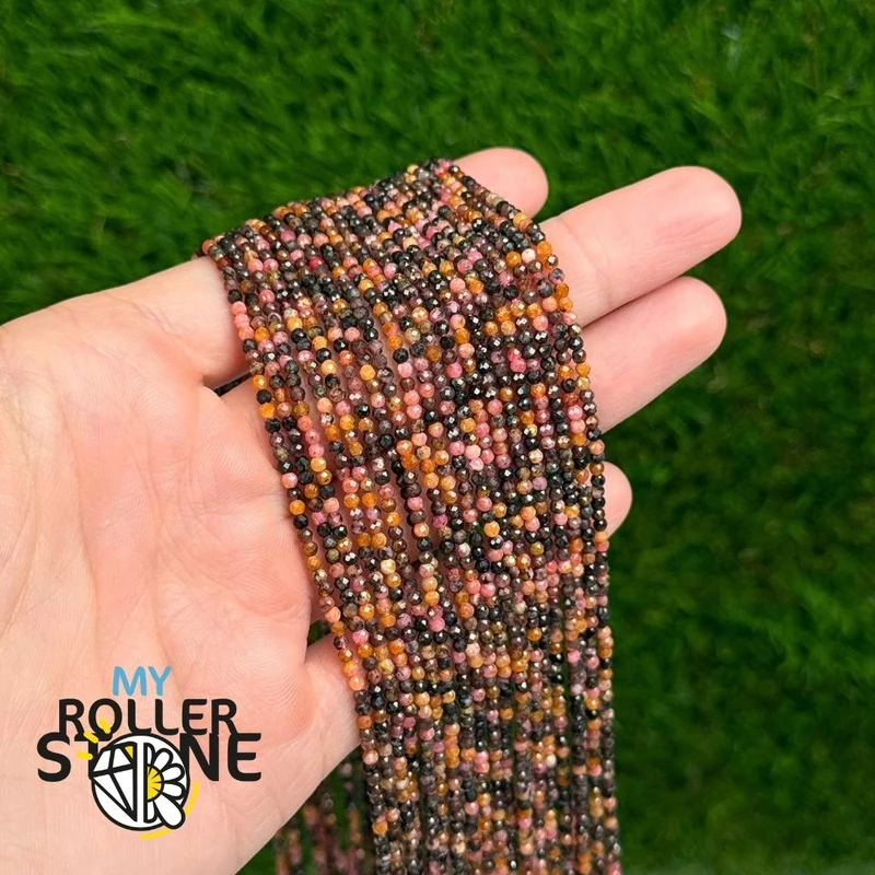 Cuenta facetada de rodonita con bustamita de 2 mm
