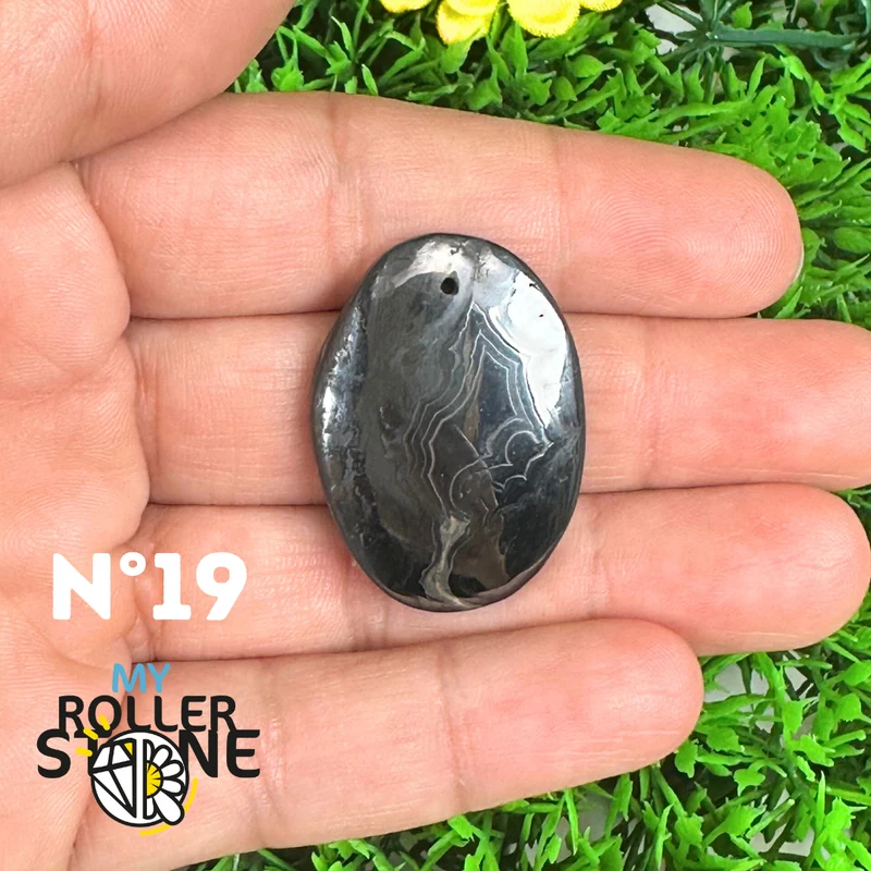 Colgante de plata con psilomelano perforado