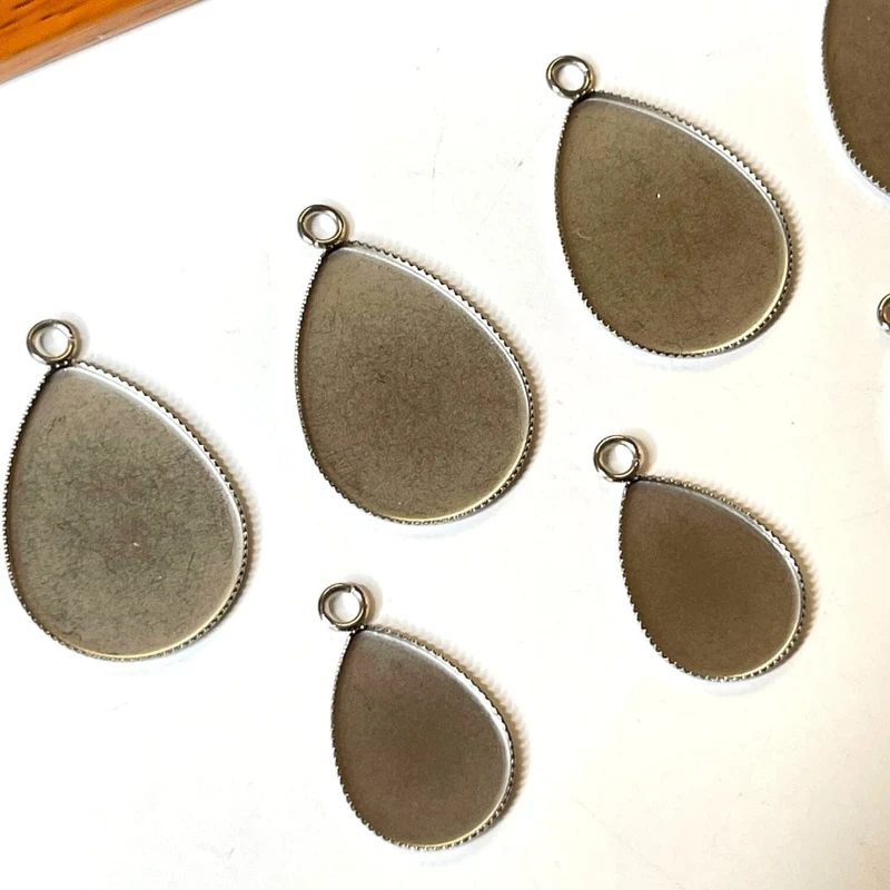 Soporte para colgante de cabujón en forma de gota de acero inoxidable