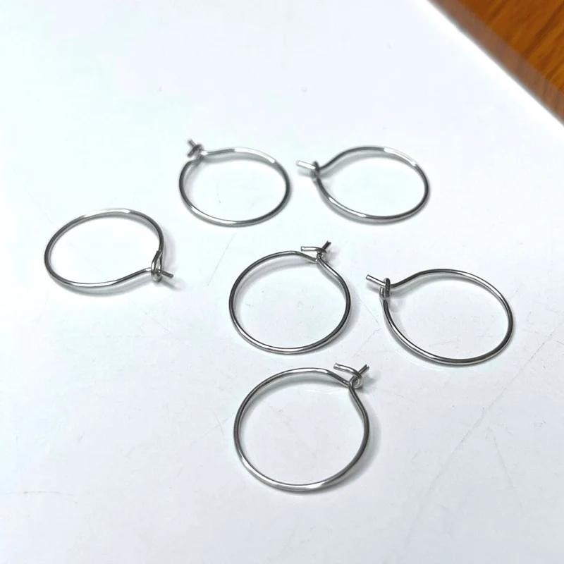 Porta aretes redondo de acero inoxidable