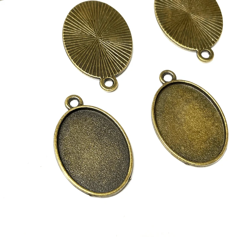 Soporte para colgante de cabujón ovalado de bronce viejo