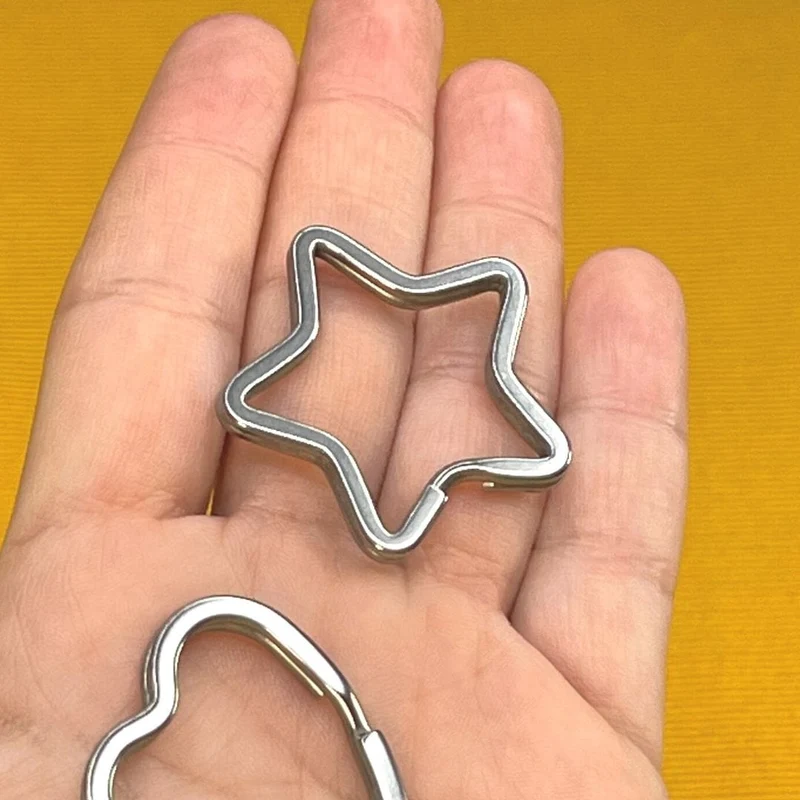 Llavero estrella de acero inoxidable